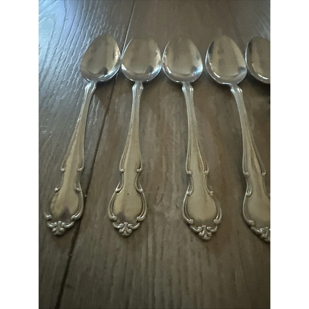 7 PCs Royal Splendor International stainless Scrolls‎ glossy Oval Place Spoons